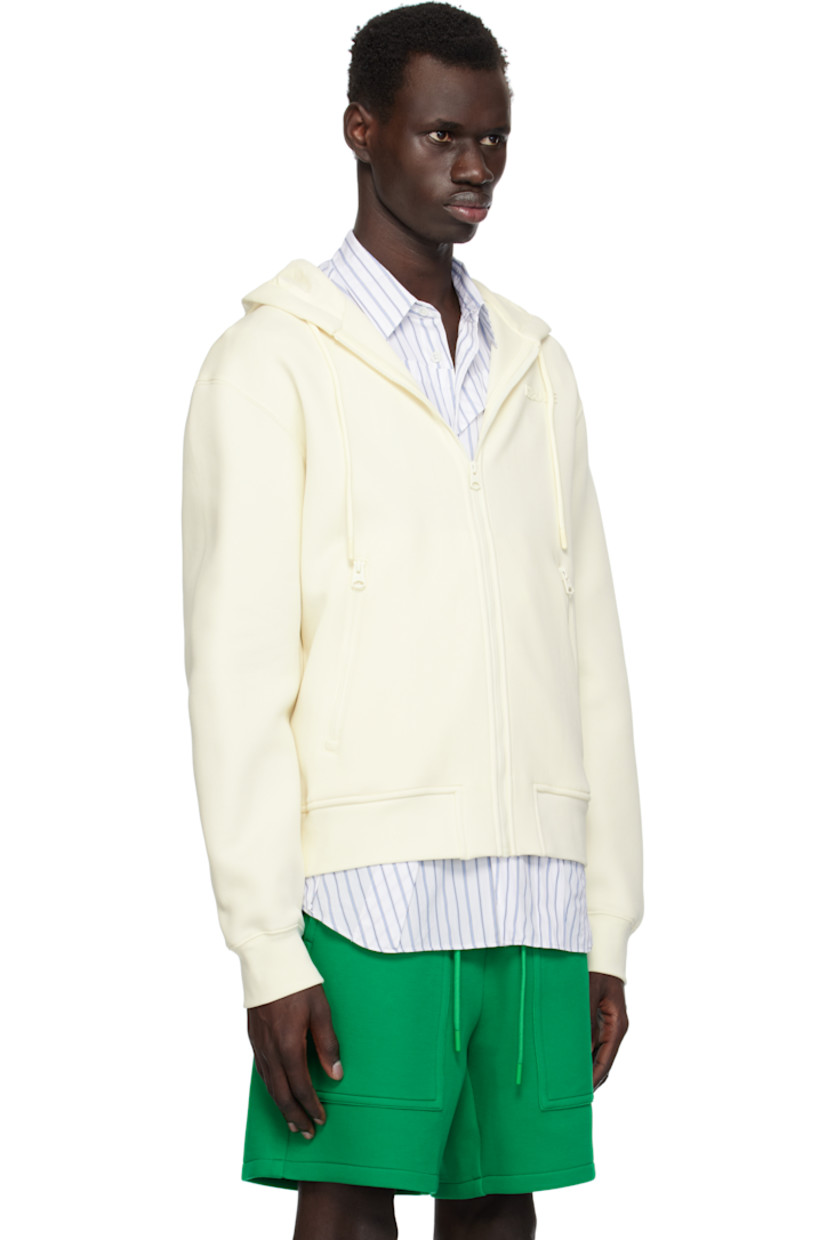 Relaxed-fit double-faced cotton-blend jersey hoodie.

· Drawstring at hood
· Logo bonded at chest
· Zip closure
· Zip pockets 
· Rib-knit hem and cuffs
· Dropped shoulders 

Supplier color: Cream