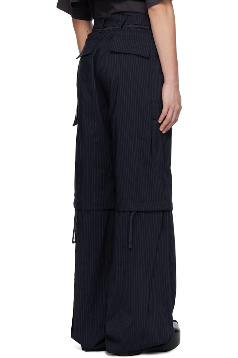 Stretch cotton-blend poplin cargo pants. Stripes and raw edges throughout.

· Drawstring at elasticized waistband
· Trim with button fastening at waistband
· Four-pocket styling
· Offset zip fly
· Logo patch at front
· Drawstring at knees and cuffs
· Cargo pocket at outseams
· Logo flag at back

Supplier color: Striped