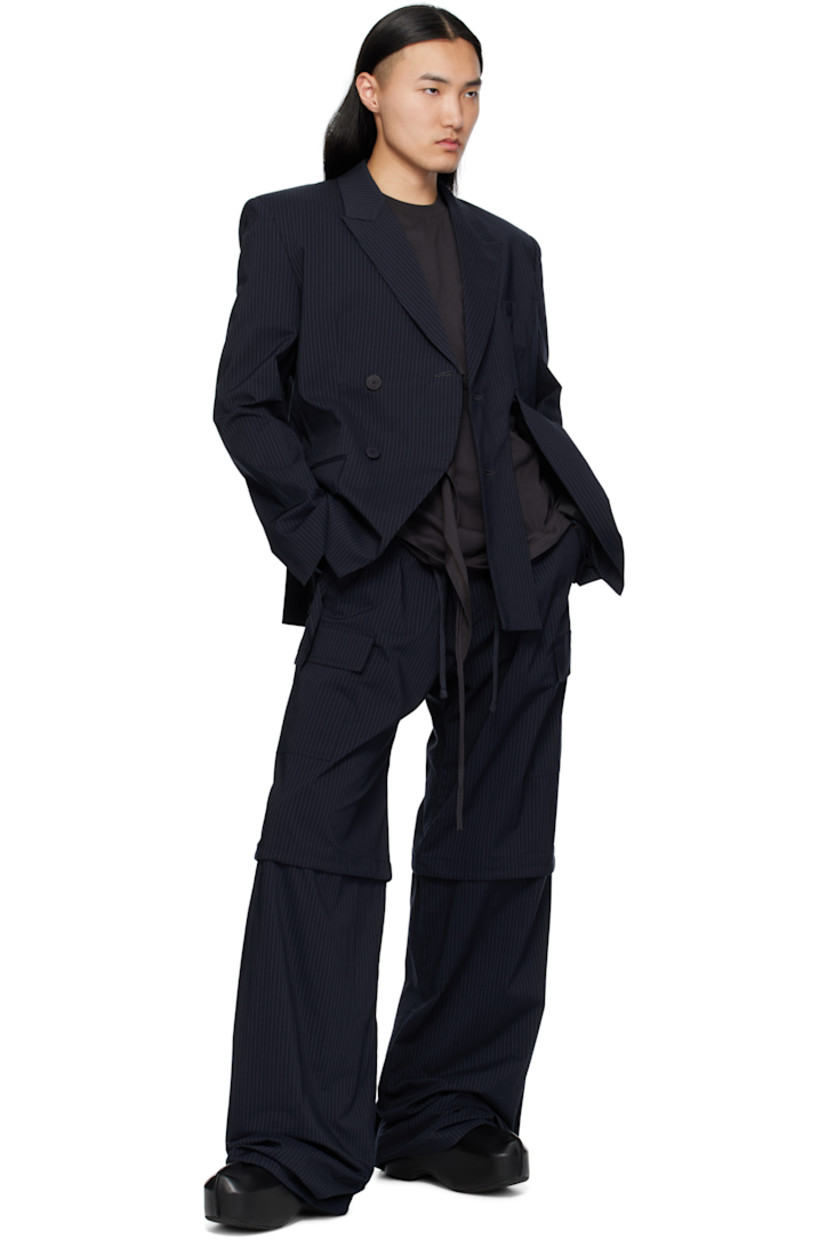Stretch cotton-blend poplin cargo pants. Stripes and raw edges throughout.

· Drawstring at elasticized waistband
· Trim with button fastening at waistband
· Four-pocket styling
· Offset zip fly
· Logo patch at front
· Drawstring at knees and cuffs
· Cargo pocket at outseams
· Logo flag at back

Supplier color: Striped