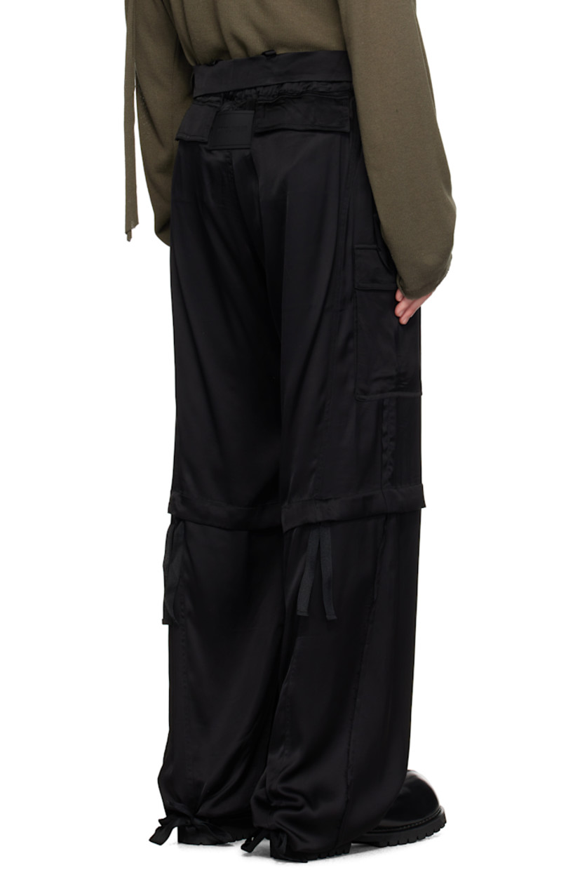 Wide-leg stretch viscose-blend satin cargo pants. Raw edges throughout.

· Drawstring at waistband and cuffs
· Four-pocket styling
· Zip fly
· Pleat and drawstring at knees
· Cargo pocket at outseams
· Rubberized logo patch at back waistband
· Logo flag at back

Supplier color: Black