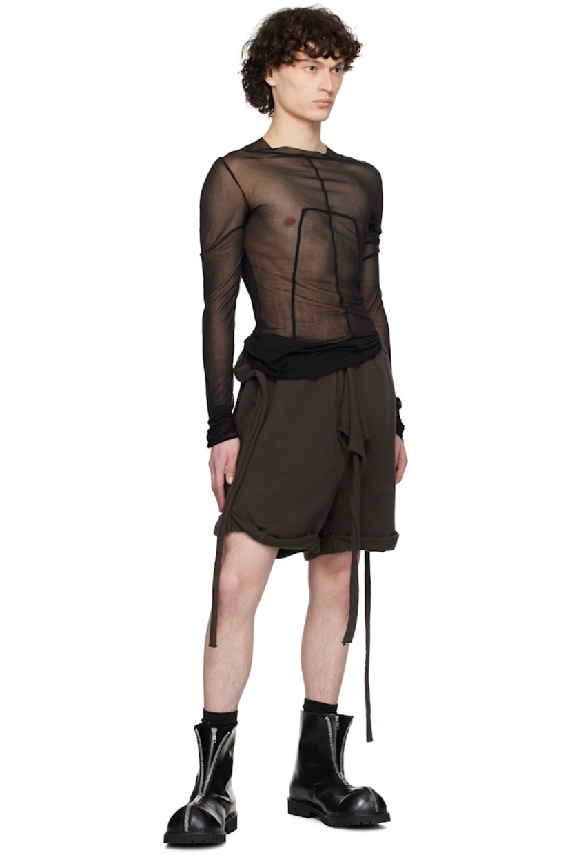 Handcrafted organic cotton French terry shorts. Rolled raw edges throughout.

· Wrap construction
· Self-tie fastenings at elasticized waistband
· Two-pocket styling

Supplier color: Dark brown