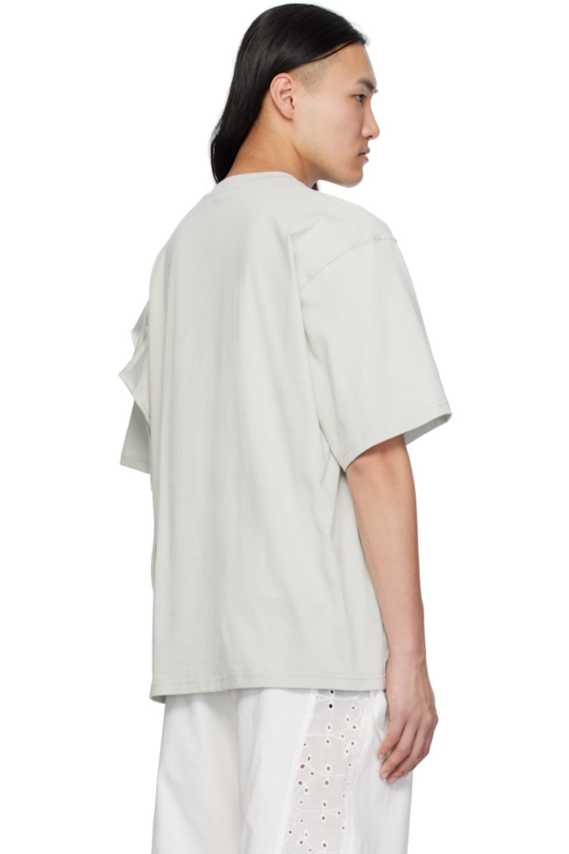 Organic cotton jersey T-shirt.

· Rib-knit crewneck
· Graphic printed at front
· Extended trim with raw edge at shoulder

Supplier color: Grey