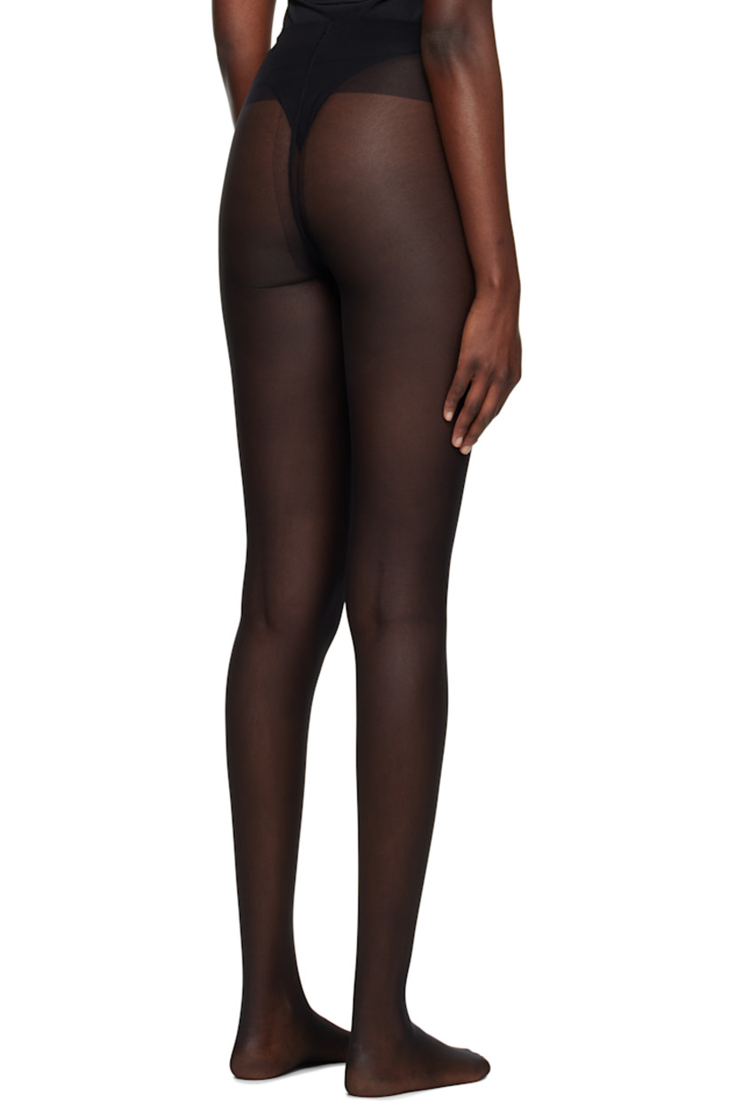 Semi-sheer stretch nylon jersey tights in black. 

· 10 denier 
· Logo-woven elasticized waistband
· Reinforced inseam and toes
· Partial jersey lining

Supplier color: Black