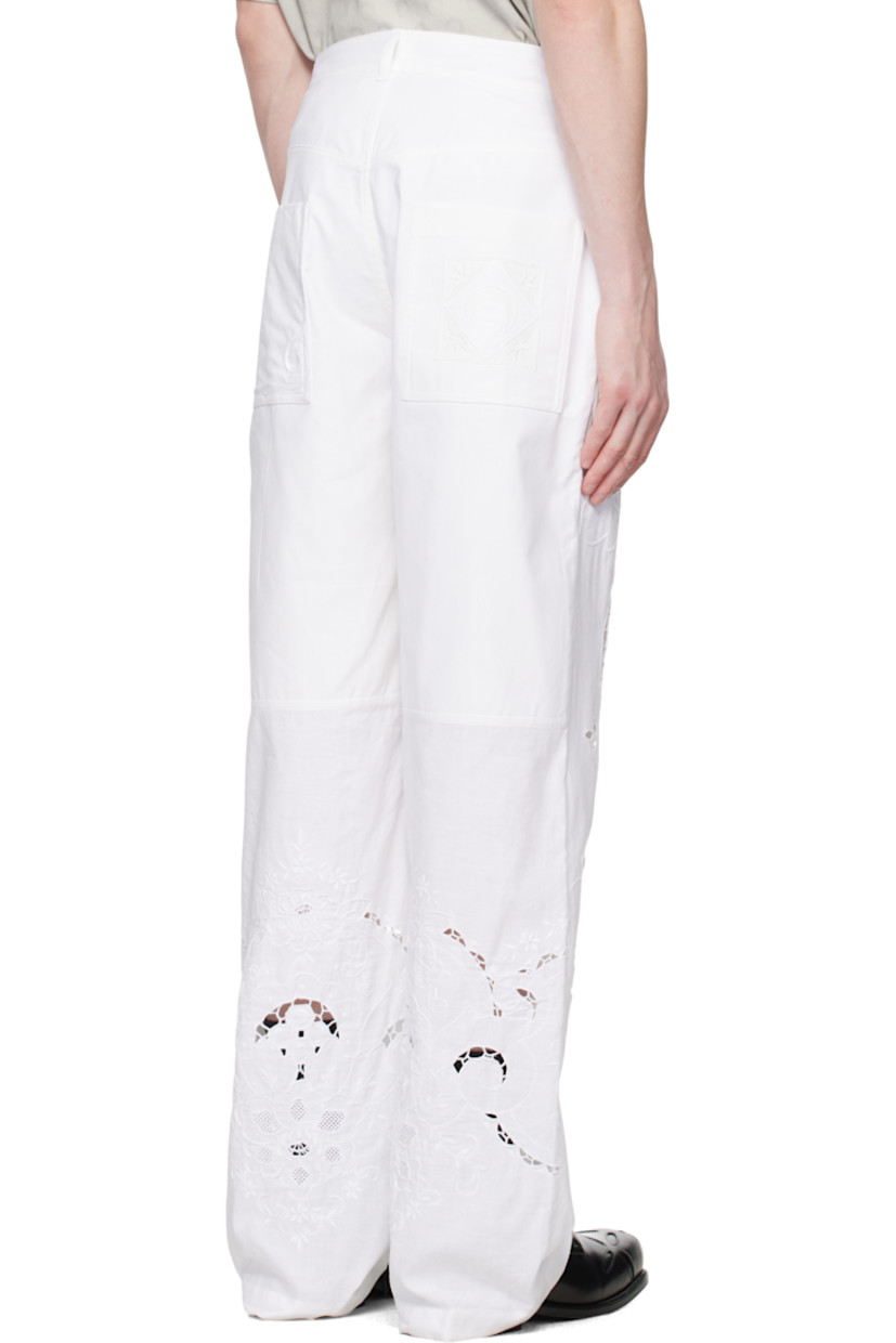 Upcycled cotton hopsack trousers. 

· Loose-fit and straight-leg
· Mid-rise 
· Paneled construction
· Belt loops
· Four-pocket styling 
· Button fly
· Broderie anglaise detailing at legs and back
· Logo embroidered at back pocket

Each item is unique. Please note finishings may vary.

Supplier color: Household linen white