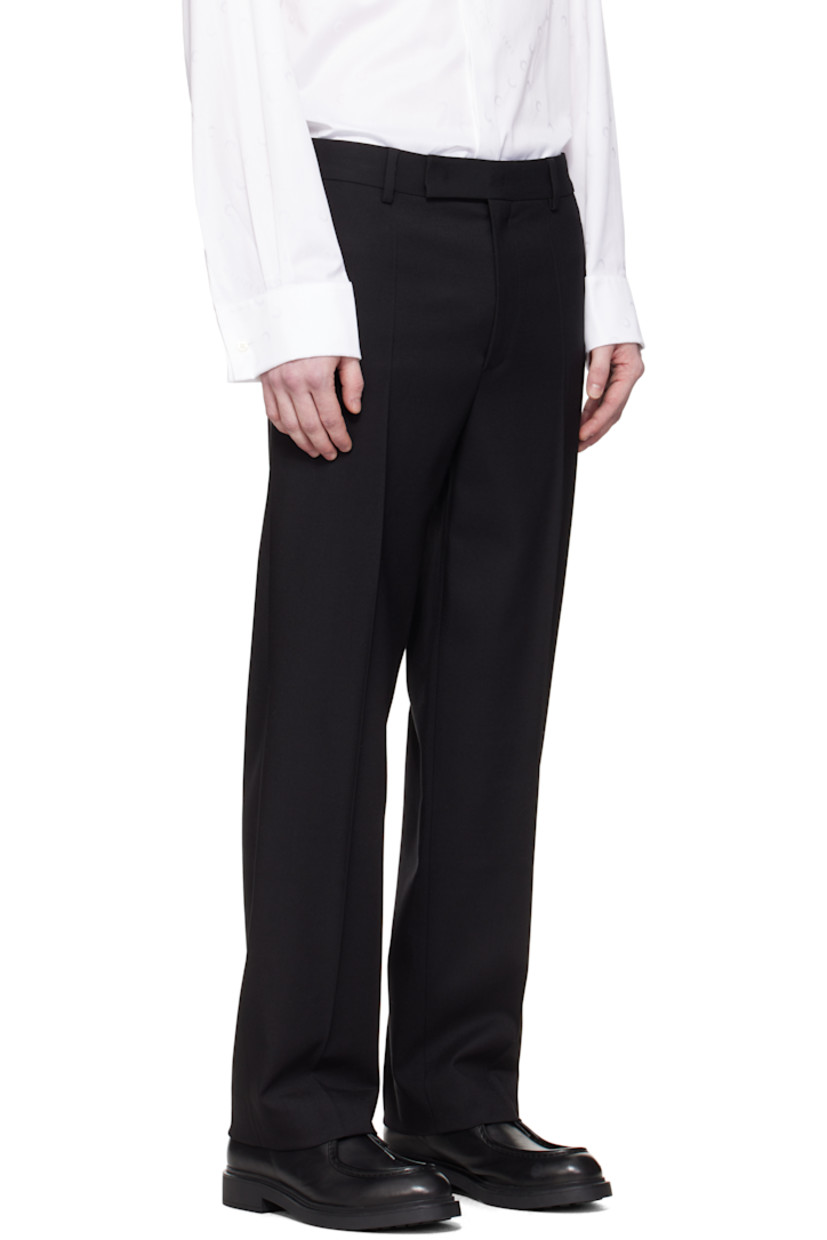 Tapered stretch RWS-certified virgin wool twill trousers.

· Mid-rise
· Belt loops
· Four-pocket styling
· Zip-fly
· Creased legs
· Logo patch at back waistband
· Partial satin lining

Supplier color: Black