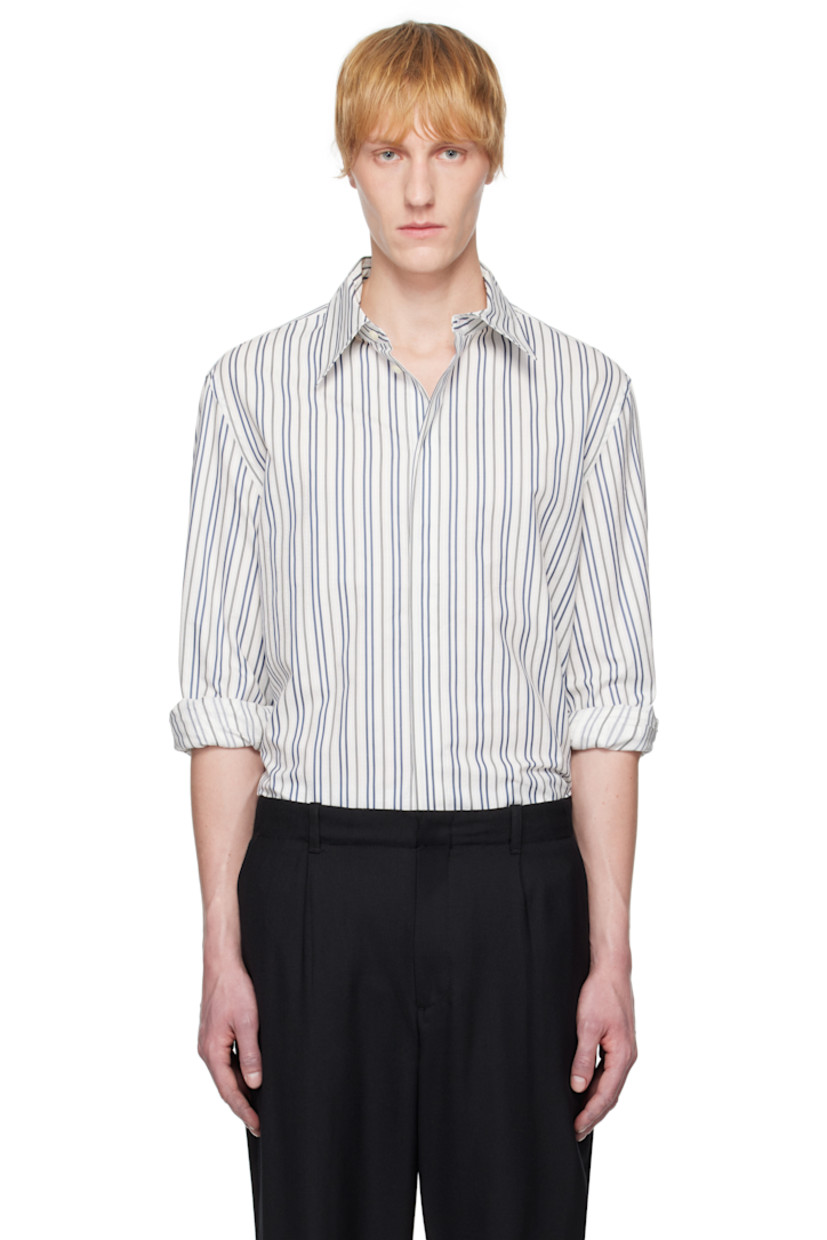 Cotton poplin shirt. Stripes throughout.

· Spread collar
· Button closure
· Buttoned French cuffs
· Logo patch at back yoke

Supplier color: Regenerated striped poplin off white