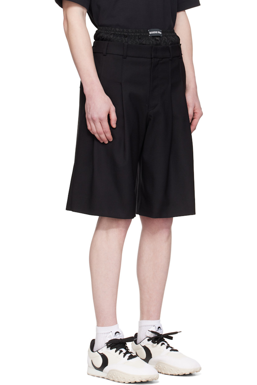 Relaxed-fit stretch virgin wool twill shorts.

· Wide-leg
· Layered construction
· Logo patch at elasticized boxers-style underlay
· Belt loops
· Four-pocket styling
· Zip-fly
· Pleats at front


Supplier color: Black
