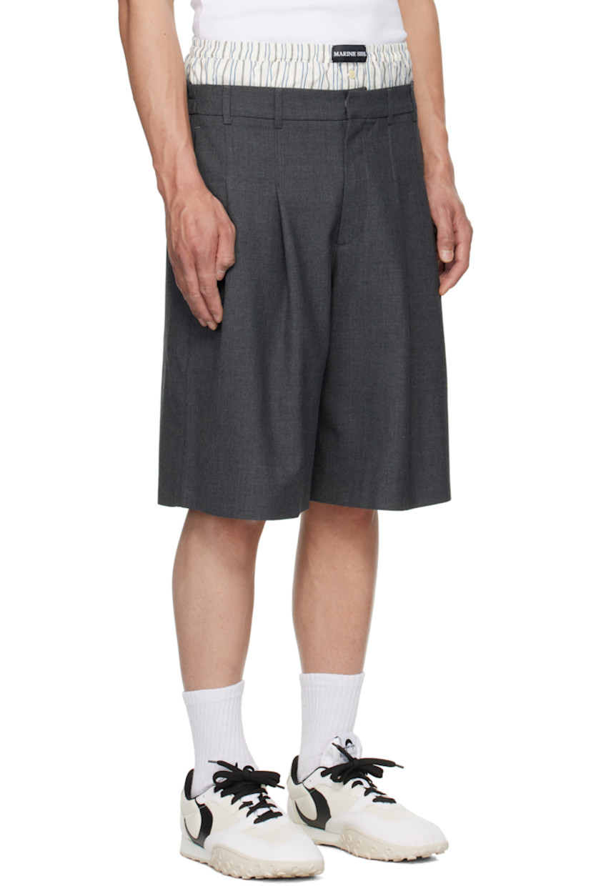Stretch polyester- and wool-blend twill shorts.

· RWS-certified wool
· Wide-leg
· Elasticized cotton poplin waistband with logo patch
· Belt loops at partially elasticized waistband
· Four-pocket styling
· Zip-fly
· Pleats at front 

Supplier color: Grey