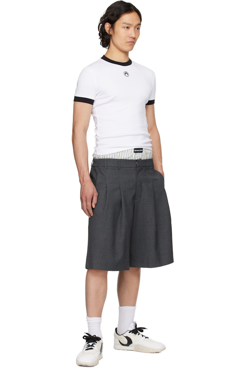 Stretch polyester- and wool-blend twill shorts.

· RWS-certified wool
· Wide-leg
· Elasticized cotton poplin waistband with logo patch
· Belt loops at partially elasticized waistband
· Four-pocket styling
· Zip-fly
· Pleats at front 

Supplier color: Grey