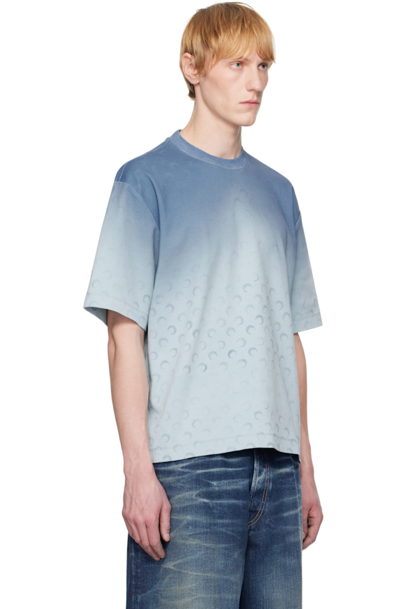 Organic and recycled cotton-blend jersey T-shirt. Gradient logo pattern printed throughout.

· Rib-knit crewneck
· Logo patch at back collar

Supplier color: Moon faded jersey light blue