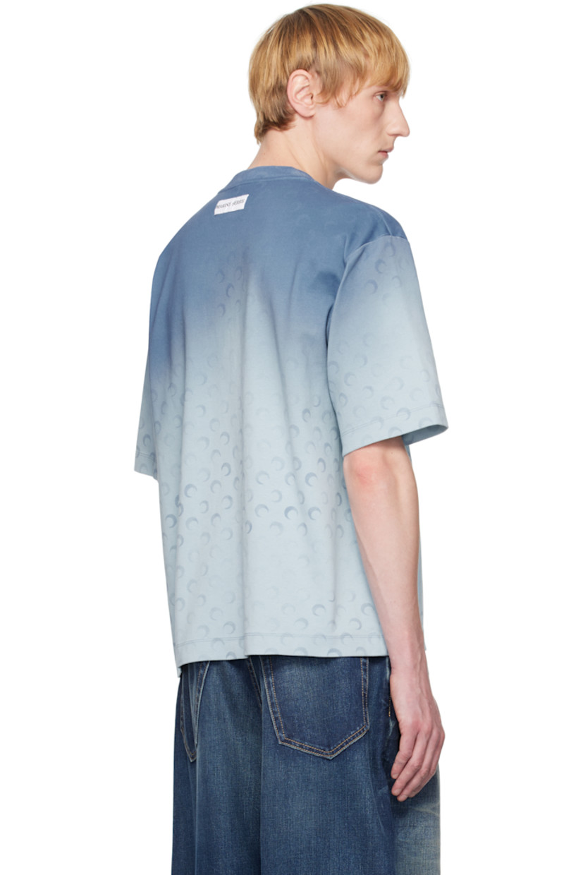 Organic and recycled cotton-blend jersey T-shirt. Gradient logo pattern printed throughout.

· Rib-knit crewneck
· Logo patch at back collar

Supplier color: Moon faded jersey light blue