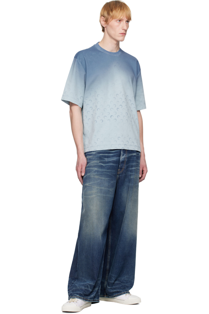 Organic and recycled cotton-blend jersey T-shirt. Gradient logo pattern printed throughout.

· Rib-knit crewneck
· Logo patch at back collar

Supplier color: Moon faded jersey light blue