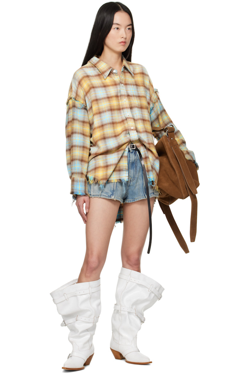 Non-stretch denim shorts. Fading and distressing throughout.

· Belt loops
· Nine-pocket styling
· Zip fly
· Leather logo patch at back waistband
· Logo-engraved antiqued bronze-tone hardware
· Contrast stitching in tan

Supplier color: Veiled blue