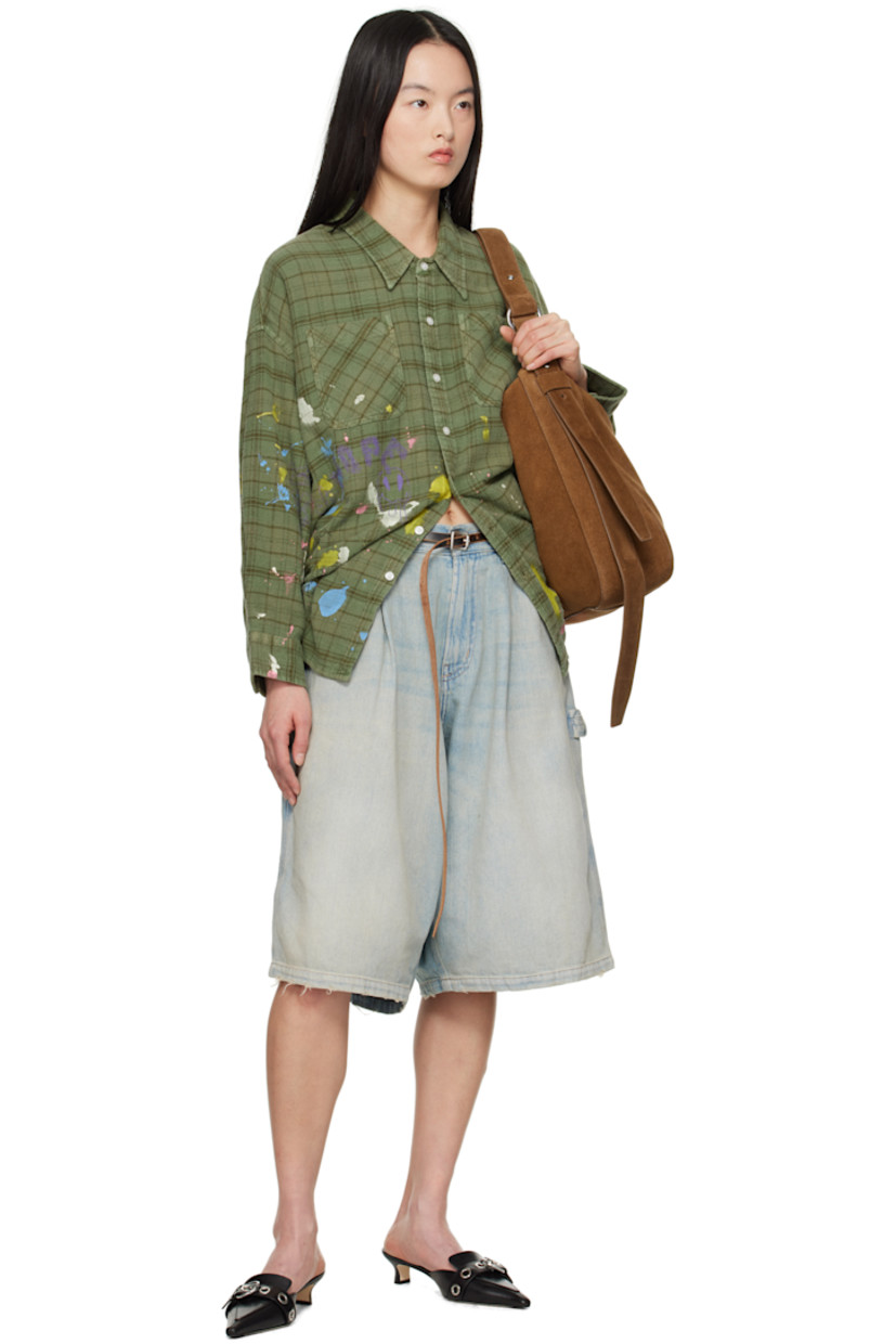 Non-stretch denim shorts. Fading, whiskering, and subtle distressing throughout.

· Belt loops
· Five-pocket styling
· Zip fly
· Pleats at front
· Hammer loop at outseam
· Patch pockets at outseam
· Leather logo patch at back waistband
· Logo patch at back pocket
· Logo-engraved antiqued bronze-tone hardware
· Contrast stitching in tan

Supplier color: Toni blue