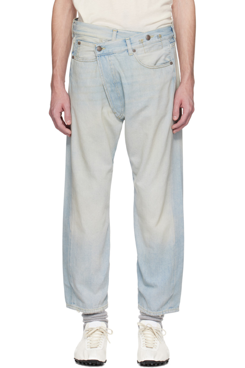 Straight-leg non-stretch denim jeans. Fading, whiskering, and subtle distressing throughout.

· Belt loops
· Button fastening at asymmetric waistband
· Five-pocket styling
· Offset button fly
· Leather logo patch at back waistband
· Logo-engraved antiqued copper-tone hardware
· Contrast stitching in yellow

Supplier color: Toni blue