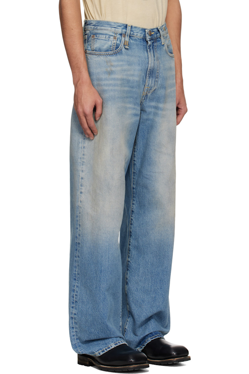Wide-leg non-stretch denim jeans. Fading, smudging, and whiskering throughout.

· Belt loops
· Five-pocket styling
· Zip fly
· Logo patch at back waistband
· Contrast stitching in tan

Supplier color: Veiled blue