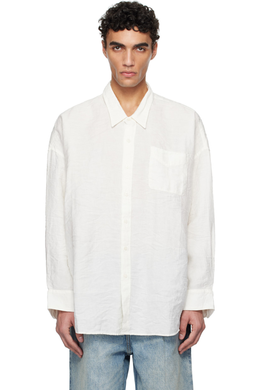 Oversized crinkled plain-woven linen-blend shirt. 

· Spread collar
· Button closure
· Patch pocket at chest 
· Droptail hem
· Single-button barrel cuffs

Supplier color: White