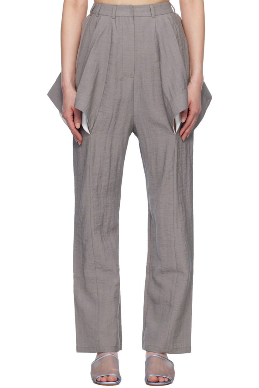 Loose-fit crinkled plain-woven rayon- and nylon-blend trousers. 

· Paneled construction
· Belt loops
· Two-pocket styling
· Zip fly
· Cutouts at front, outseams, and back
· Central seam at front and back legs
· Dropped inseam

Supplier color: Stone gray
