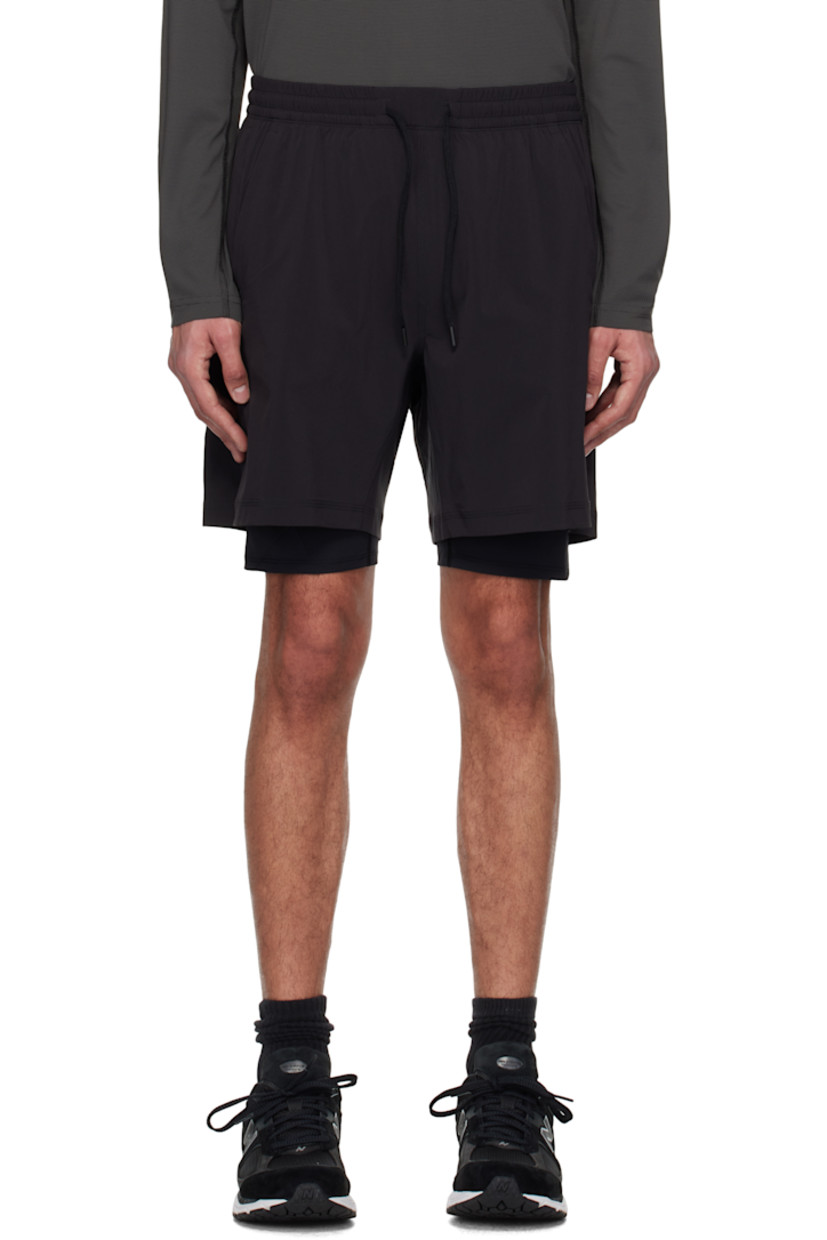 Lightweight stretch nylon jersey shorts. Integrated recycled nylon-blend jersey underlay compression shorts.

· Moisture-wicking and quick-drying
· Layered construction
· Drawstring at elasticized waistband
· Three-pocket styling
· Logo patch at outseam

Supplier color: Black