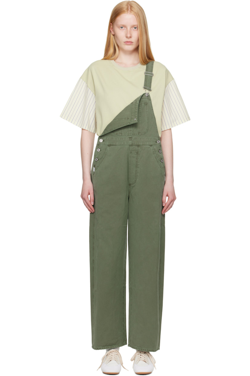 Non-stretch regenerative cotton denim overalls. Fading and whiskering throughout.

· Square neck
· Patch pocket at chest
· Four-pocket styling
· Mock fly
· Button fastening at outseams
· Logo patch at outseam
· Adjustable shoulder straps
· Logo-engraved silver-tone hardware

Supplier color: Cadet