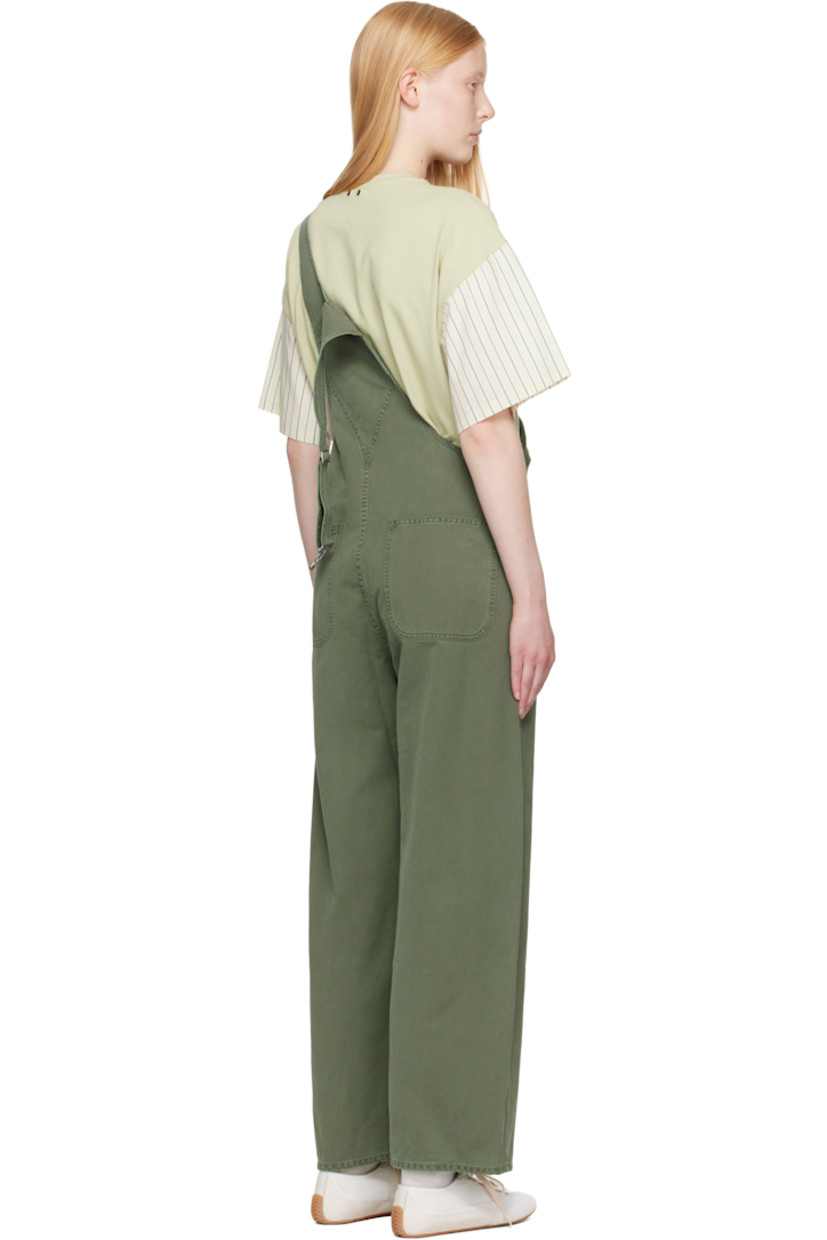Non-stretch regenerative cotton denim overalls. Fading and whiskering throughout.

· Square neck
· Patch pocket at chest
· Four-pocket styling
· Mock fly
· Button fastening at outseams
· Logo patch at outseam
· Adjustable shoulder straps
· Logo-engraved silver-tone hardware

Supplier color: Cadet