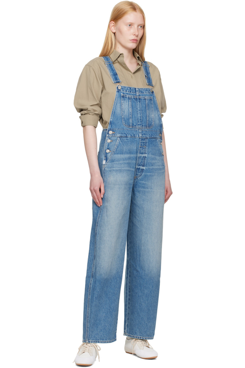 Non-stretch regenerative cotton denim overalls. Fading and whiskering throughout.

· Square neck
· Patch pocket at chest
· Four-pocket styling
· Mock fly
· Button fastening at outseams
· Logo patch at outseam
· Adjustable shoulder straps
· Logo-engraved silver-tone hardware
· Contrast stitching in beige

Supplier color: Arta