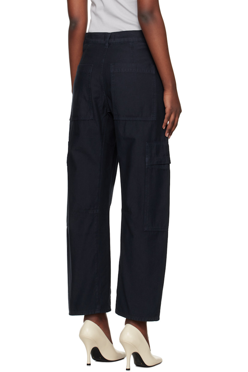 Tapered non-stretch regenerative cotton twill trousers. 

· Loose-fit and straight-leg
· Belt loops
· Four-pocket styling
· Zip fly
· Dart at front and back knees
· Logo patch at outseam
· Flap pocket at outseams

Supplier color: True navy