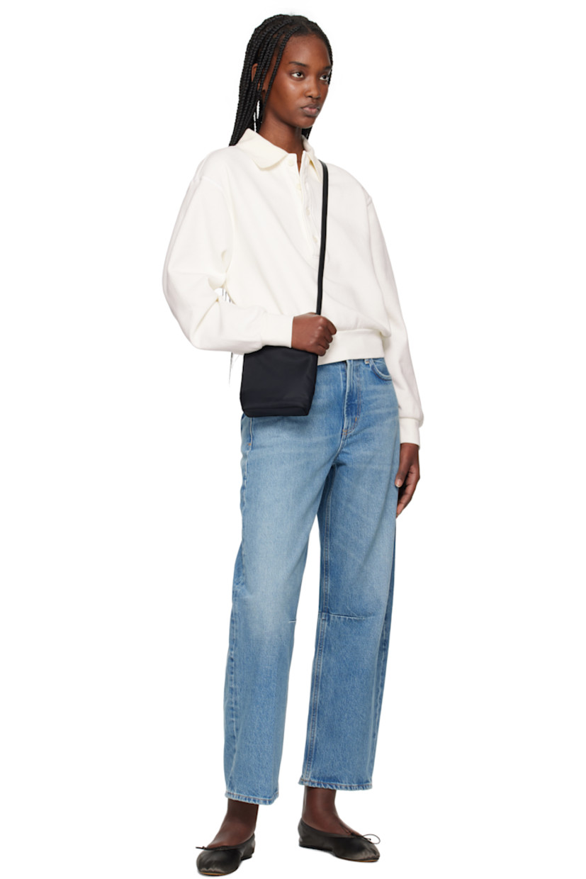 Cotton-blend fleece sweatshirt. 

· Rib-knit spread collar, hem, and cuffs
· Four-button placket
· Dropped shoulders
· Cropped hem 

Supplier color: Pashmina