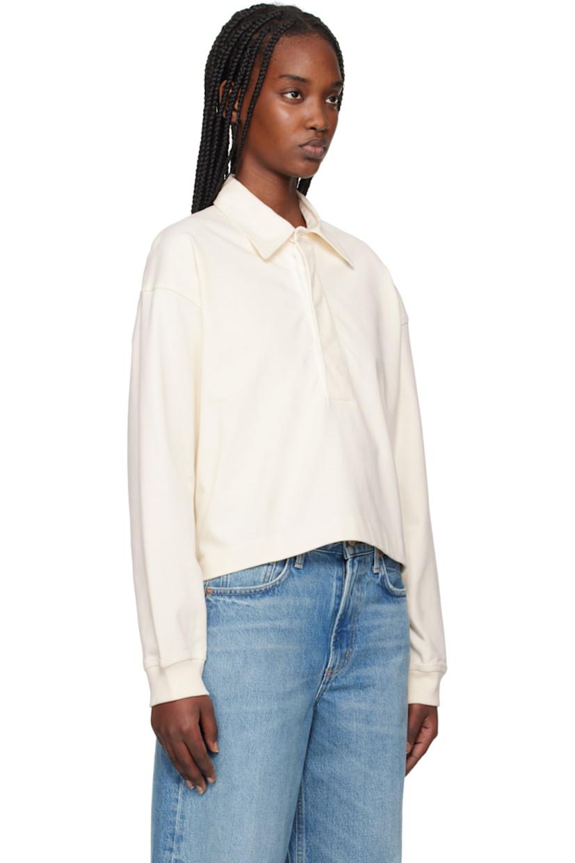 Cotton jersey polo. 

· Spread collar
· Concealed five-button placket
· Cropped hem
· Dropped shoulders
· Rib-knit cuffs

Supplier color: Pashmina