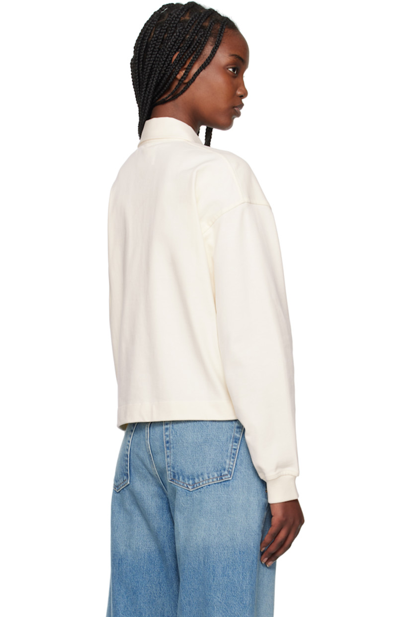 Cotton jersey polo. 

· Spread collar
· Concealed five-button placket
· Cropped hem
· Dropped shoulders
· Rib-knit cuffs

Supplier color: Pashmina