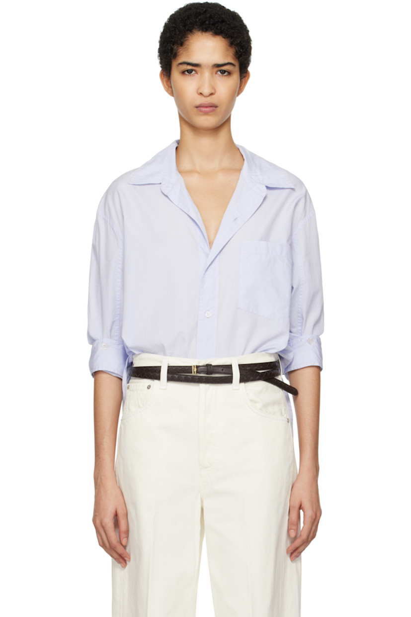 Loose-fit lightweight cotton poplin shirt.

· Spread collar
· Button closure
· Patch pocket at chest
· Droptail hem
· Dropped shoulders
· Button fastenings at sleeves
· Single-button barrel cuffs
· Locker loop and pleats at back yoke

Part of the HUMANITY collection.

Supplier color: Santa Cruz