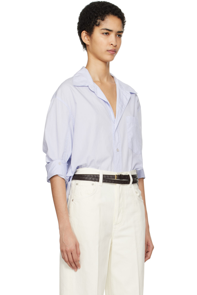 Loose-fit lightweight cotton poplin shirt.

· Spread collar
· Button closure
· Patch pocket at chest
· Droptail hem
· Dropped shoulders
· Button fastenings at sleeves
· Single-button barrel cuffs
· Locker loop and pleats at back yoke

Part of the HUMANITY collection.

Supplier color: Santa Cruz