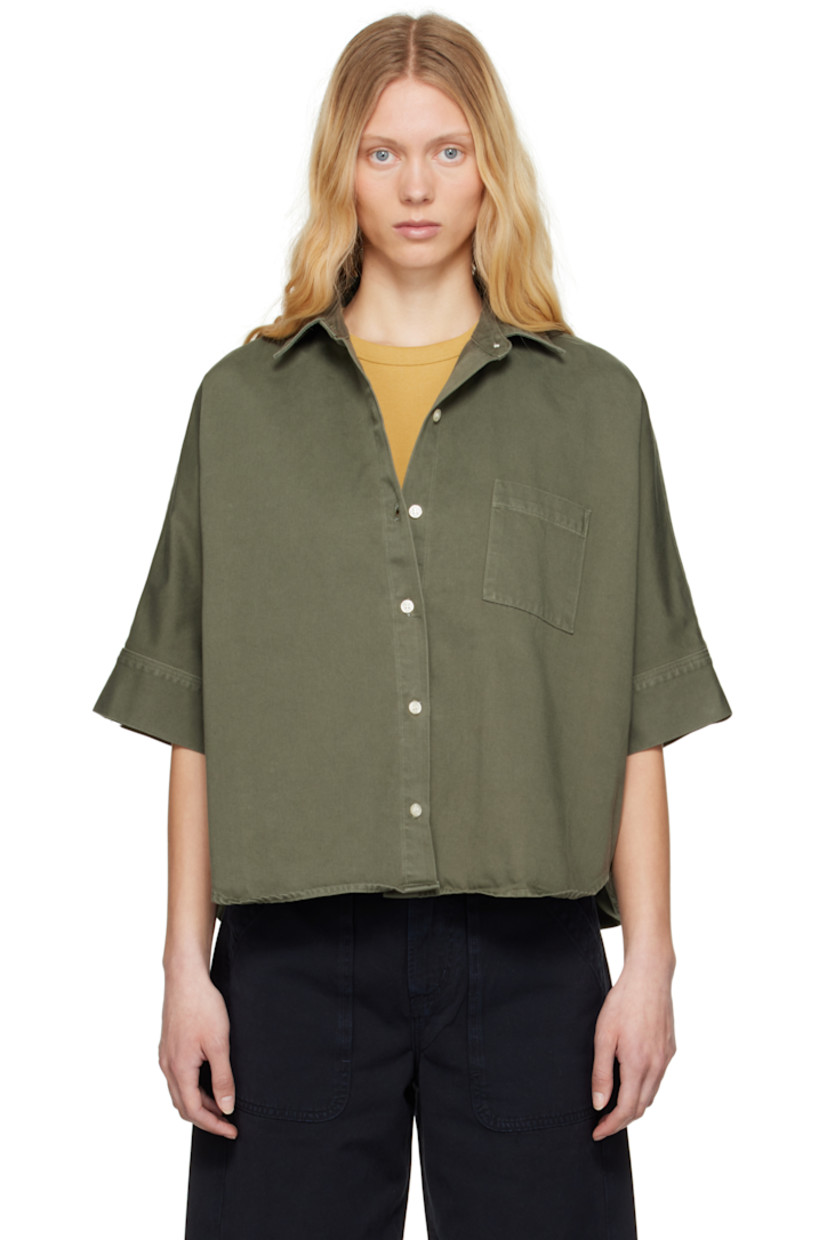 Oversized regenerative cotton poplin shirt. Subtle fading throughout.

· Loose-fit
· Spread collar
· Button closure
· Patch pocket at chest
· Shirttail hem
· Yoke sleeves
· Single-button barrel cuffs
· Locker loop and box pleat at back yoke

Part of the HUMANITY collection.

Supplier color: Dogwood
