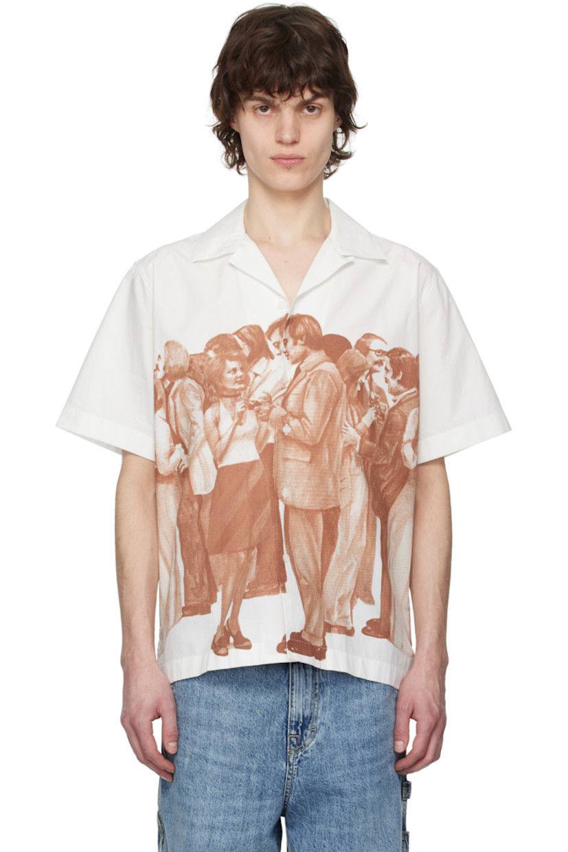 Cotton poplin shirt.

· Open spread collar
· Button closure
· Graphic printed at front and back
· Vented side seams

Supplier color: Off-white