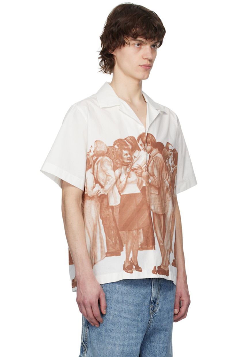 Cotton poplin shirt.

· Open spread collar
· Button closure
· Graphic printed at front and back
· Vented side seams

Supplier color: Off-white