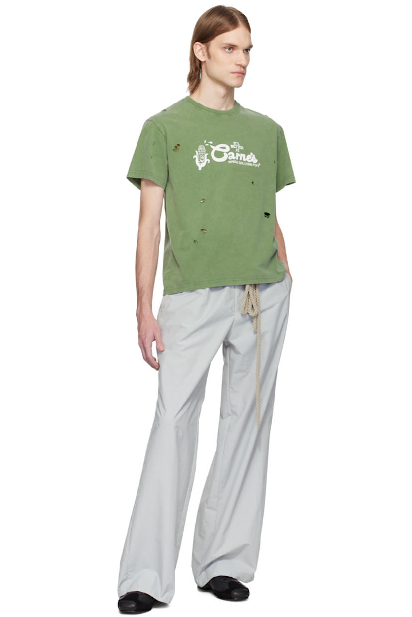 Boxy-fit organic cotton jersey T-shirt. Distressing throughout. 

· Rib-knit crewneck
· Graphic and text printed at chest

Supplier color: Off-green