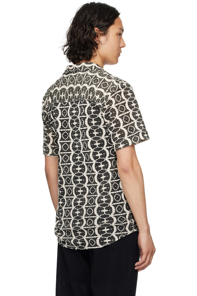 Open-knit cotton shirt. Graphic pattern printed throughout.

· Open spread collar
· Button closure
· Shirttail hem

Supplier color: Black