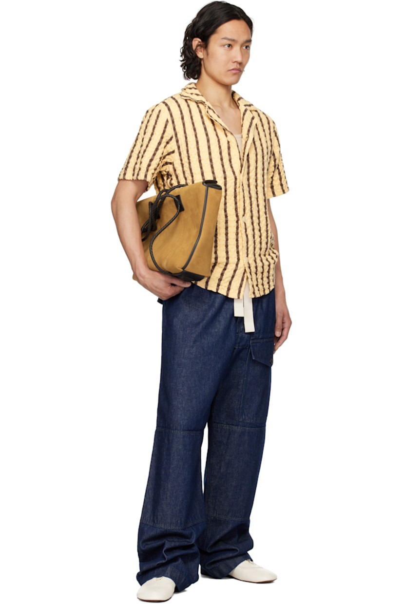 Heavyweight waffle-woven cotton shirt. Stripes throughout.

· Open spread collar
· Button closure
· Shirttail hem

Supplier color: Tartufo