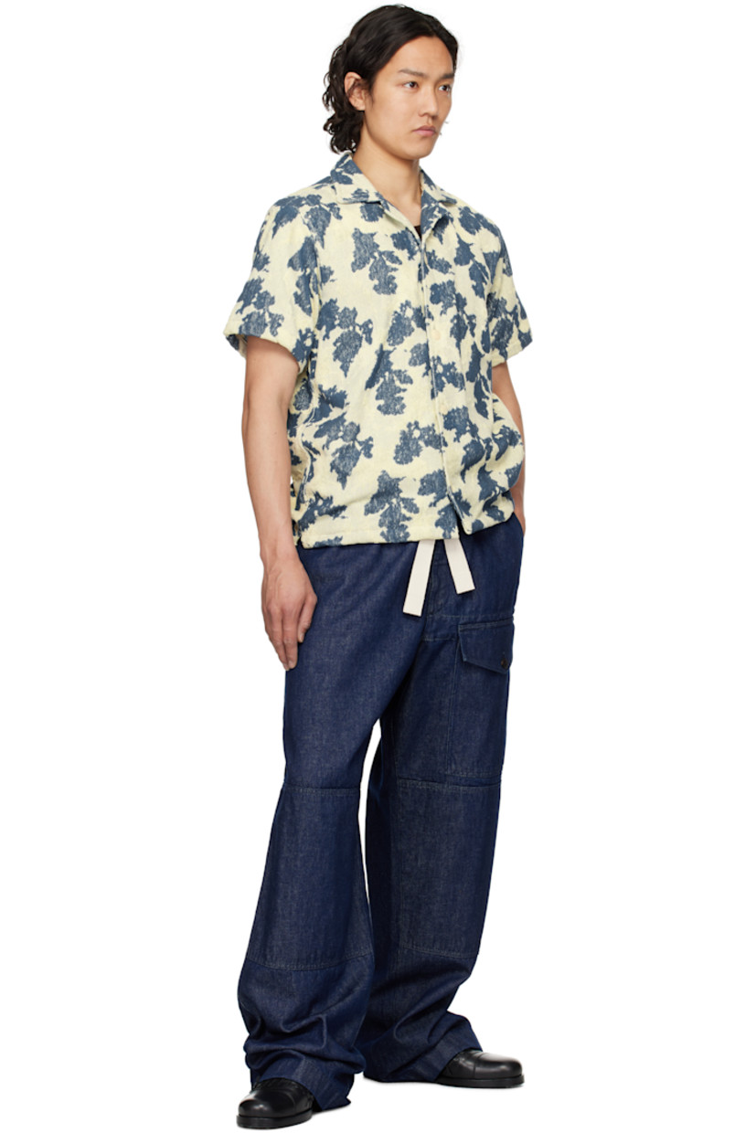Heavyweight cotton terrycloth shirt. Jacquard graphic pattern throughout.

· Open spread collar
· Button closure
· Tennis-tail hem

Supplier color: Multi