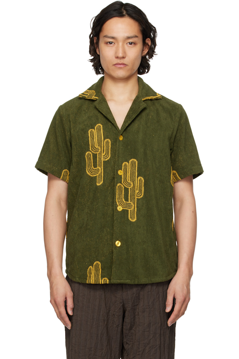 Heavyweight cotton terrycloth shirt. Jacquard graphic pattern throughout.

· Open spread collar
· Button closure
· Shirttail hem

Supplier color: Green