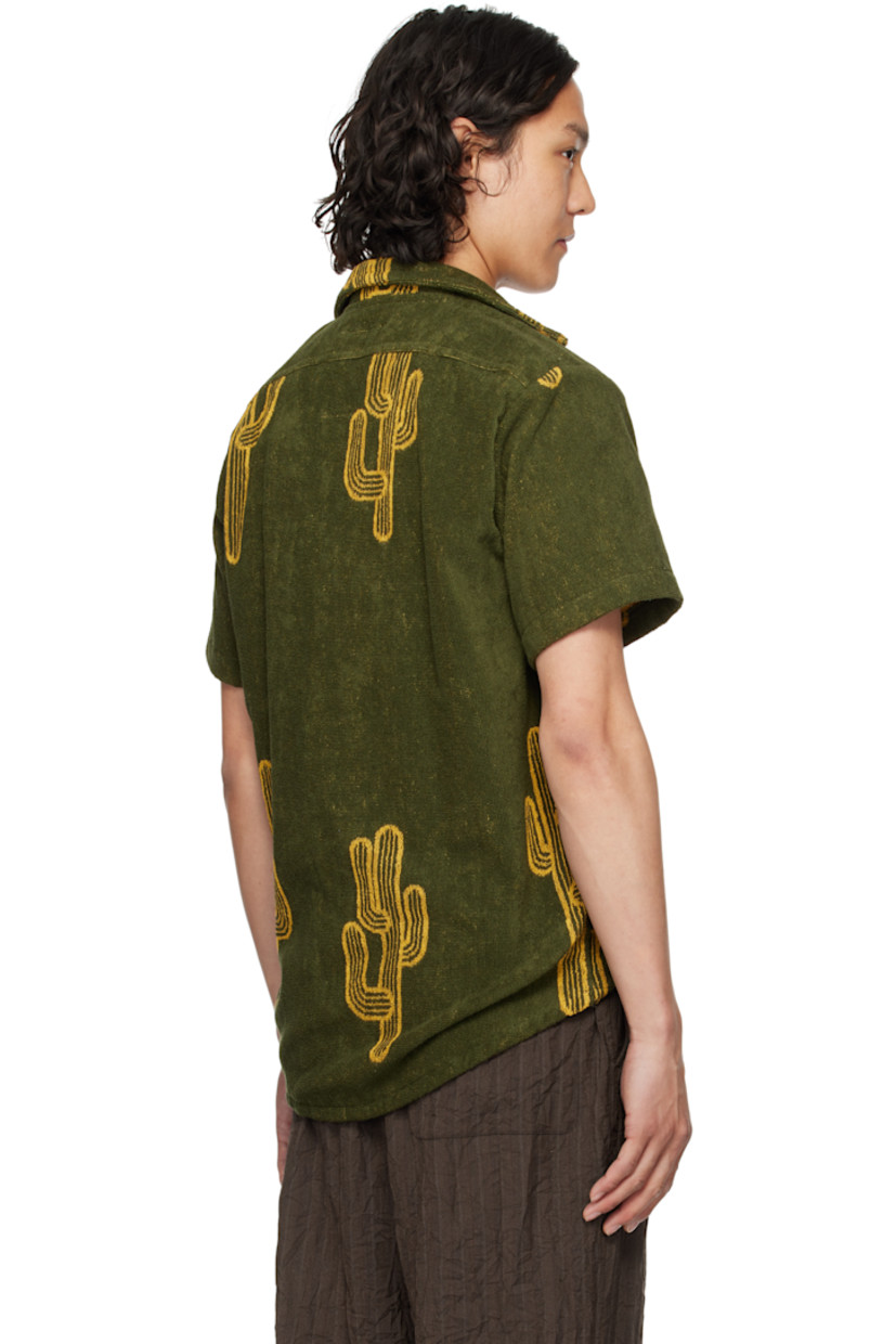 Heavyweight cotton terrycloth shirt. Jacquard graphic pattern throughout.

· Open spread collar
· Button closure
· Shirttail hem

Supplier color: Green