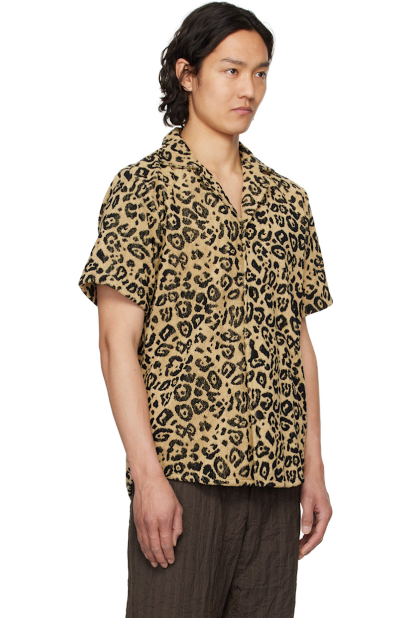 Heavyweight cotton terrycloth shirt. Jacquard leopard pattern throughout.

· Open spread collar
· Button closure
· Shirttail hem

Supplier color: Beige
