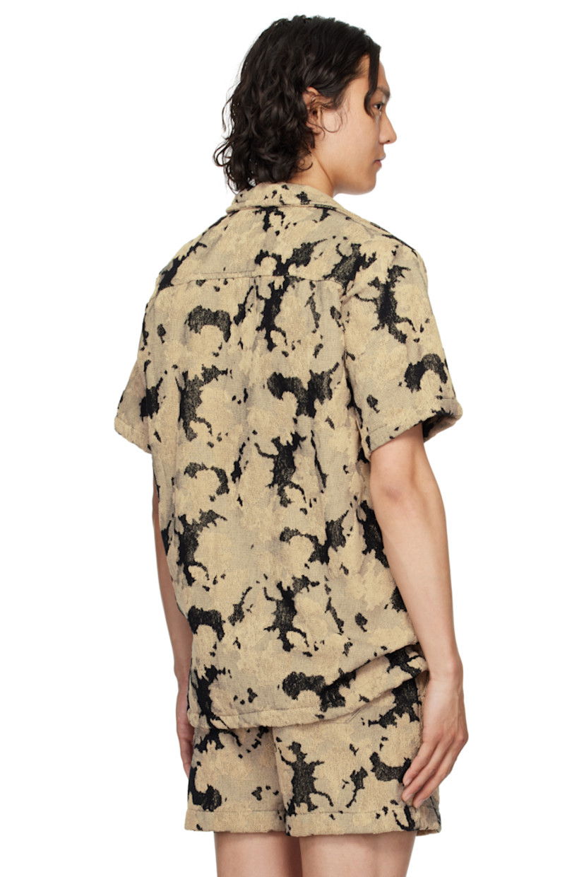 Heavyweight cotton terrycloth shirt. Jacquard graphic pattern throughout.

· Open spread collar
· Button closure
· Tennis-tail hem

Supplier color: Multi