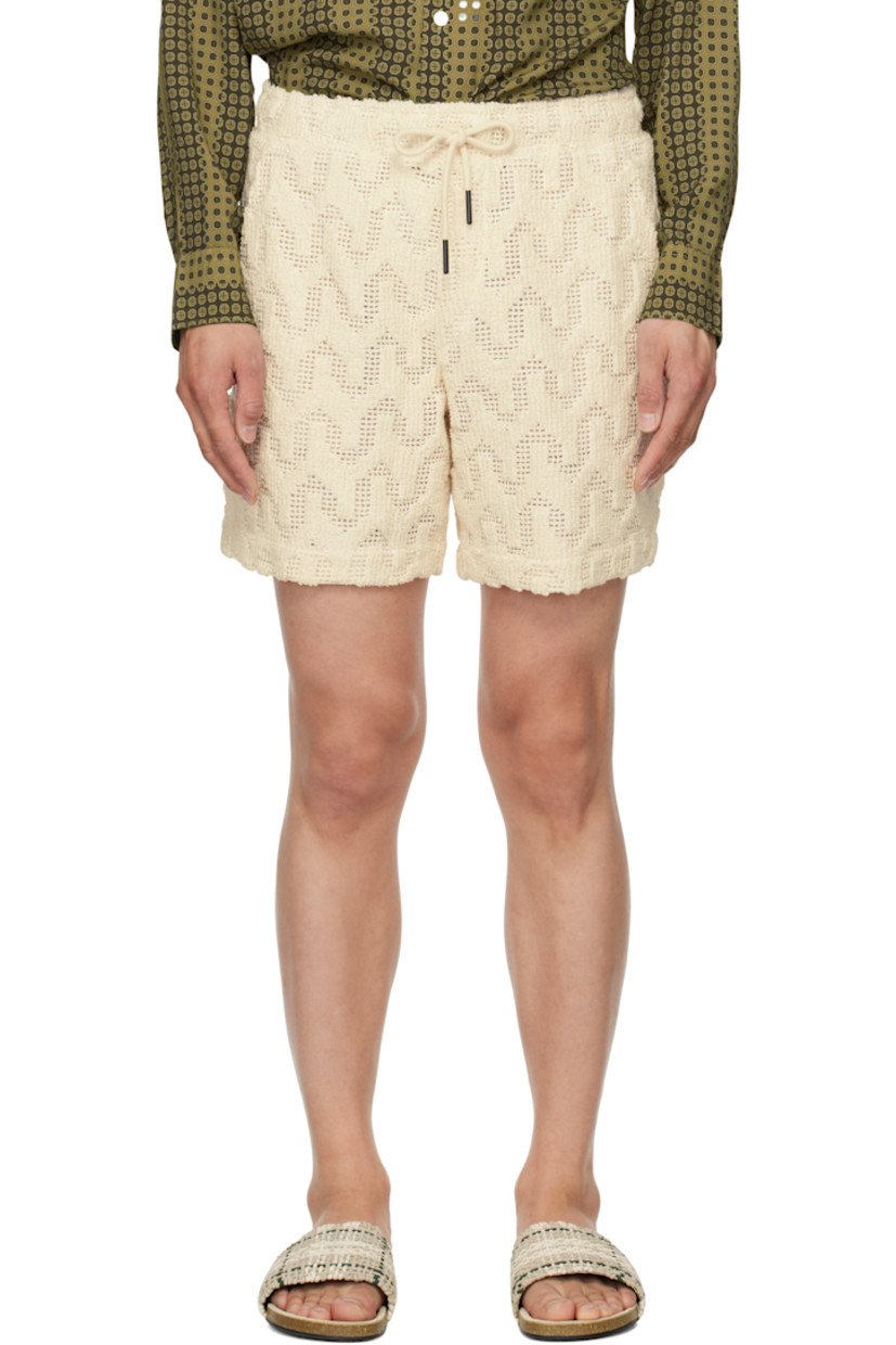 Heavyweight crocheted cotton-blend shorts. Jacquard graphic pattern throughout.

· Mid-rise
· Drawstring at elasticized waistband
· Three-pocket styling
· Mock fly
· Full poplin lining

Supplier color: Off-white