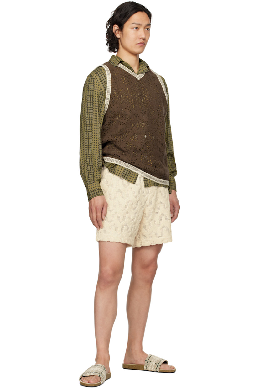 Heavyweight crocheted cotton-blend shorts. Jacquard graphic pattern throughout.

· Mid-rise
· Drawstring at elasticized waistband
· Three-pocket styling
· Mock fly
· Full poplin lining

Supplier color: Off-white