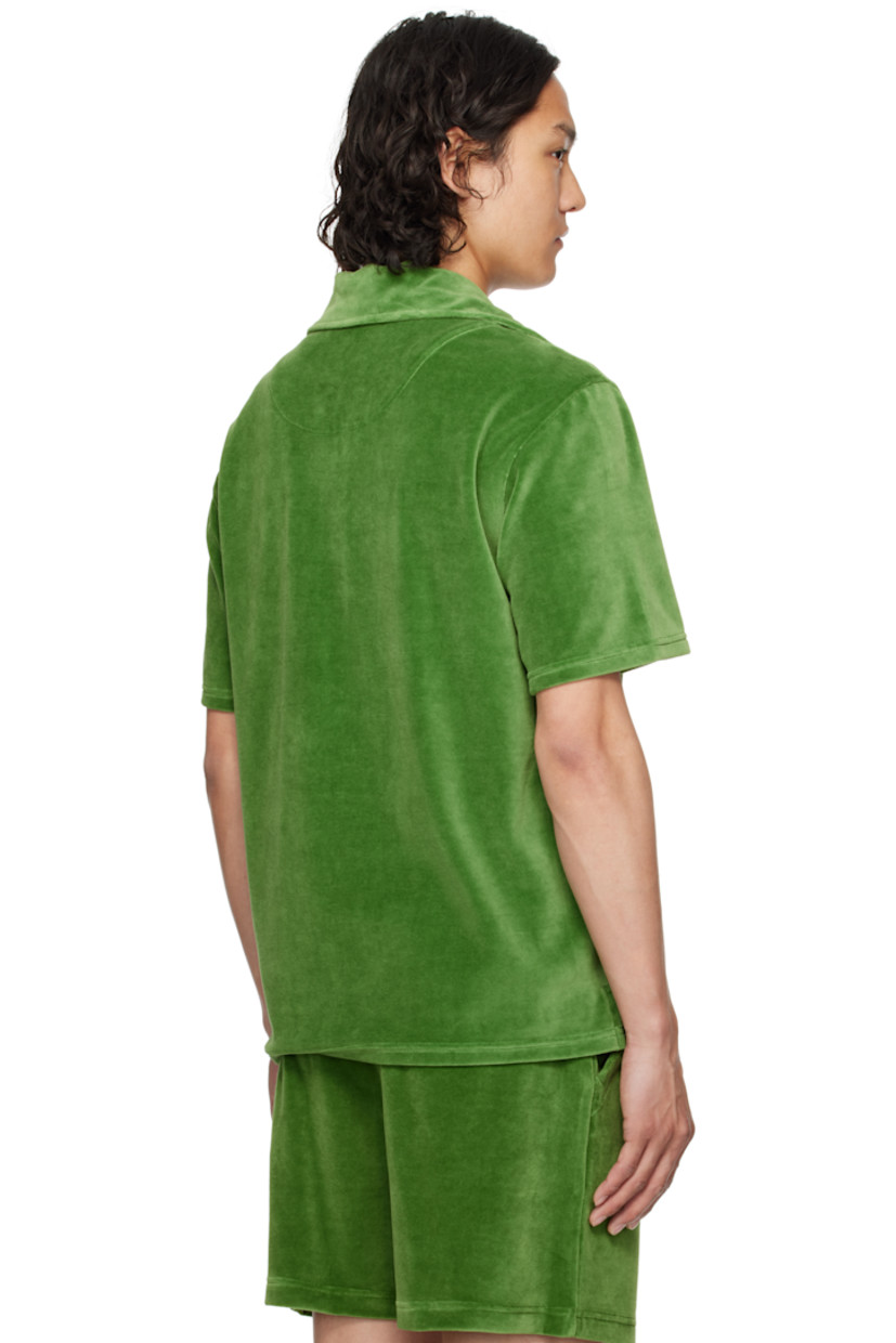 Cotton-blend velour polo.

· Spread collar
· Three-button placket
· Patch pocket at chest
· Tennis-tail hem
· Mother-of-pearl hardware

Supplier color: Green