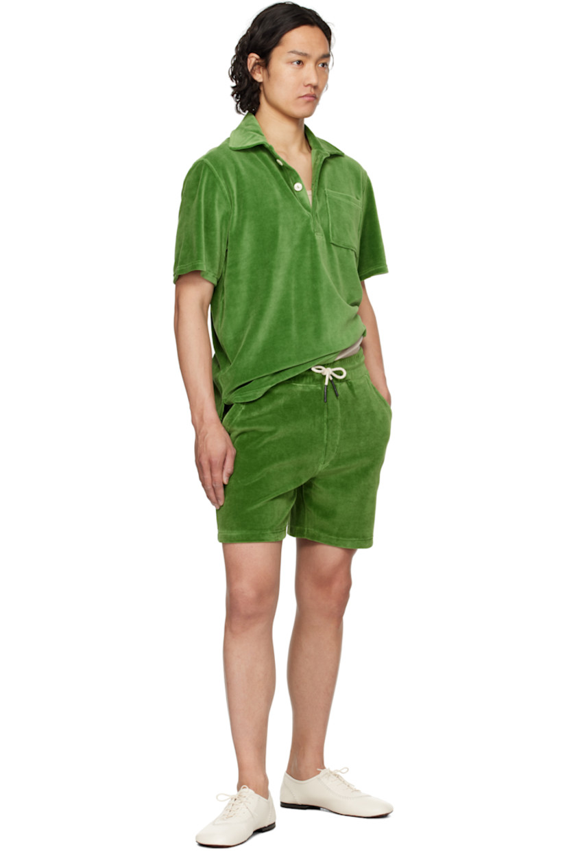 Cotton-blend velour polo.

· Spread collar
· Three-button placket
· Patch pocket at chest
· Tennis-tail hem
· Mother-of-pearl hardware

Supplier color: Green