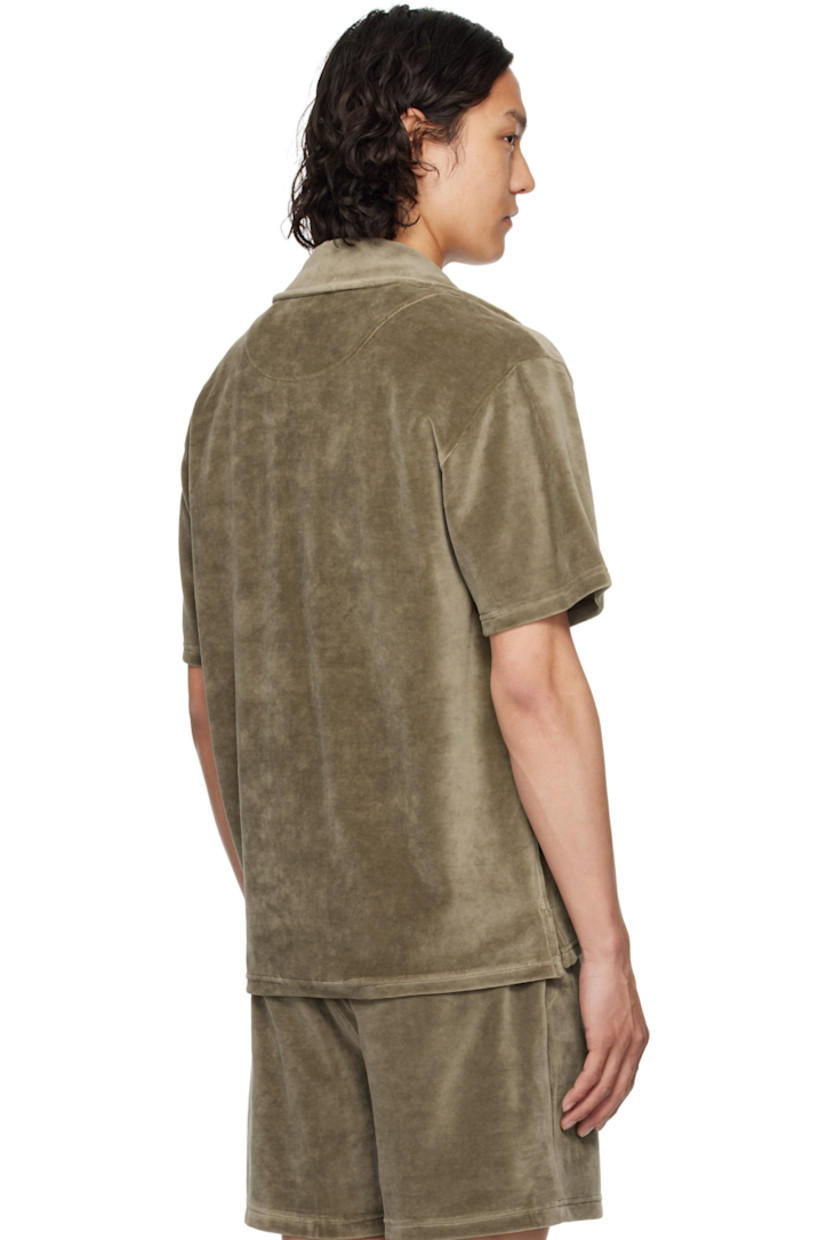 Cotton-blend velour polo.

· Spread collar
· Three-button placket
· Patch pocket at chest
· Tennis-tail hem
· Mother-of-pearl hardware

Supplier color: Grey