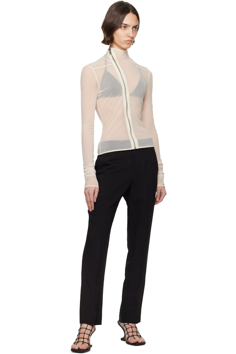 Sheer GRS-certified recycled polyester jersey jacket.

· Lightweight
· Stand collar
· Offset zip closure
· Offset shoulder seams
· Elasticized cuffs

Supplier color: Dove