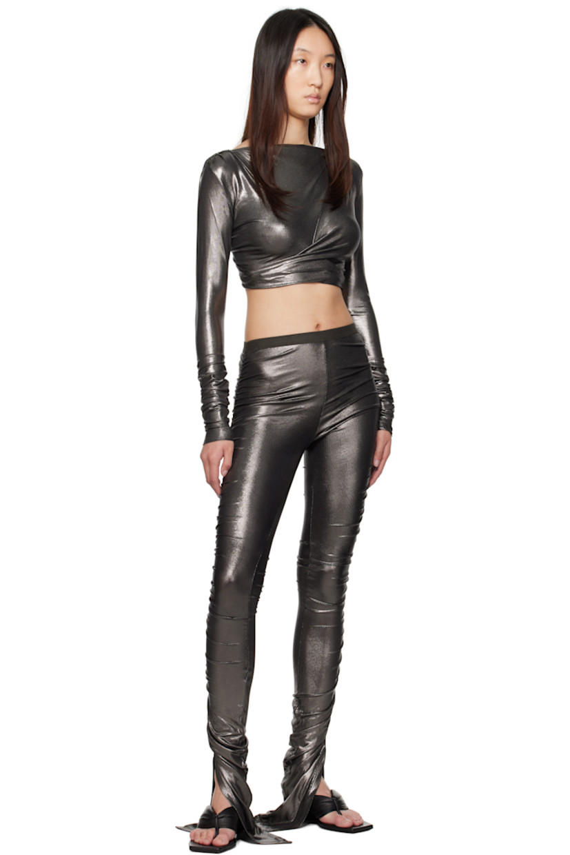 Foil-coated stretch viscose jersey leggings.

· FSC®-certified viscose
· Elasticized waistband
· Vent at cuffs
· Ruching at outseams

Supplier color: Gunmetal